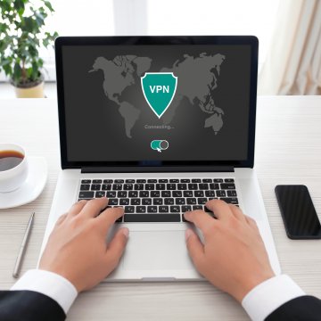 man on laptop vpn on monitor